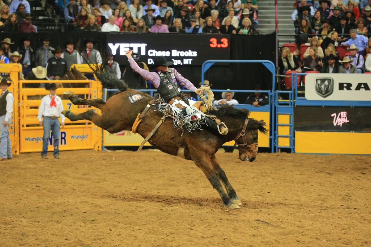 National Finals Rodeo Deer Lodge's Chase Brooks wins buckle at first