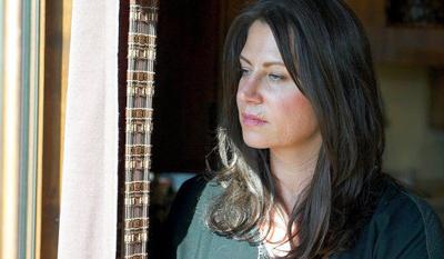 Target of online trolls suing neo-Nazi website's publisher