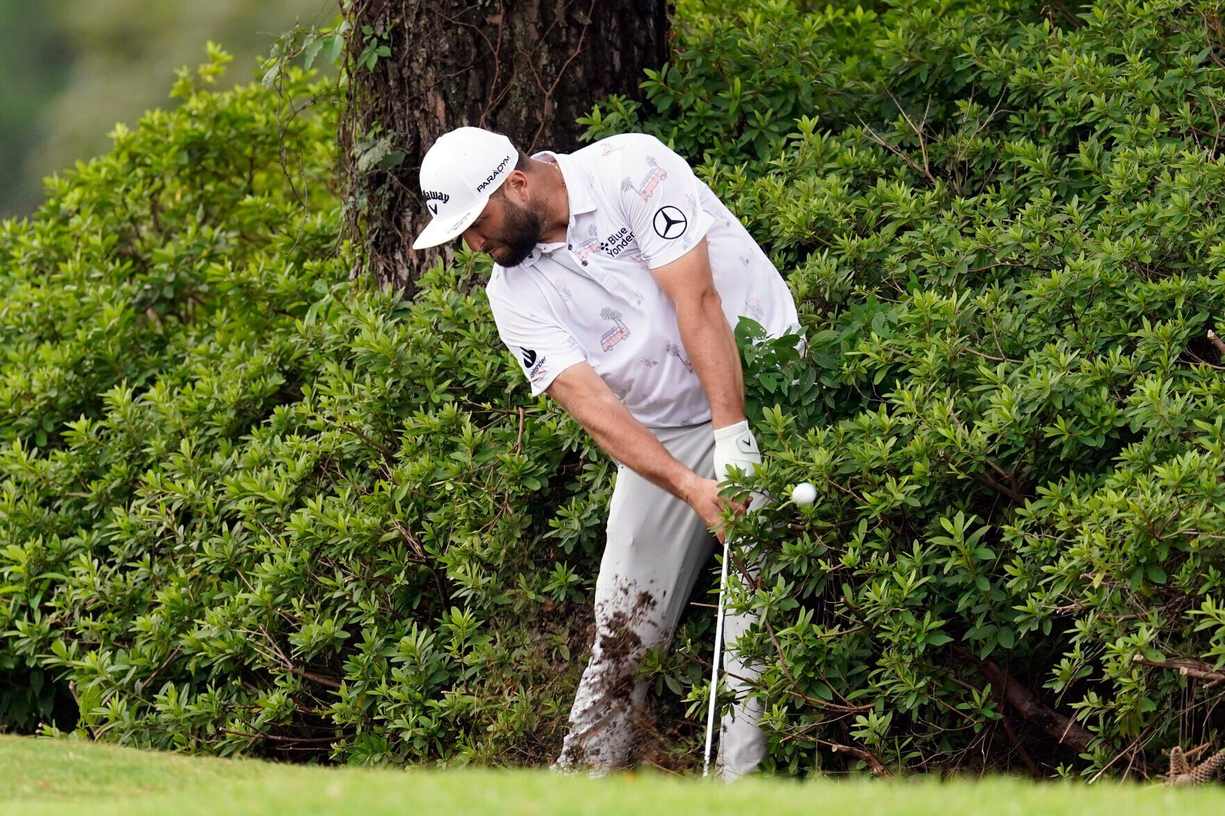 Spieth keeps a clean card in the mud to lead playoff opener