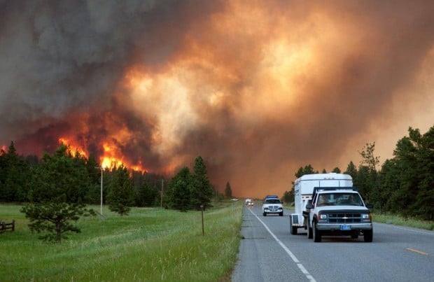 Dozens of homes burn in southeastern Montana wildfires