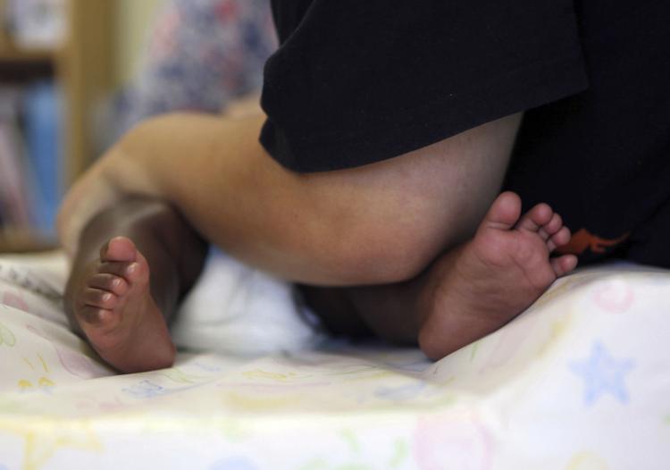 Why do human mothers reject their babies image