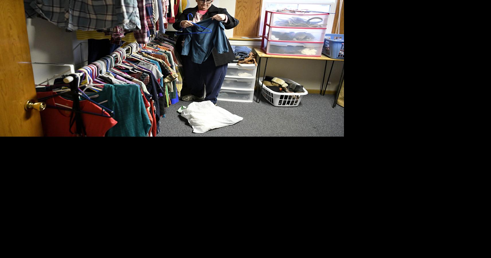 Two churches come together to offer free food, clothes