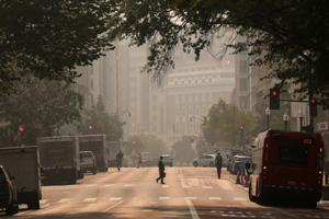 Smoke, fire, floods: US faces triple extreme summer weather threats
