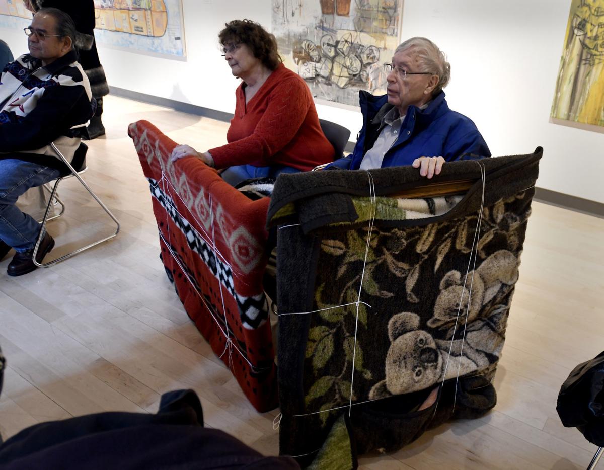 Antiques Roadshow appraisers examine artifacts at Missoula