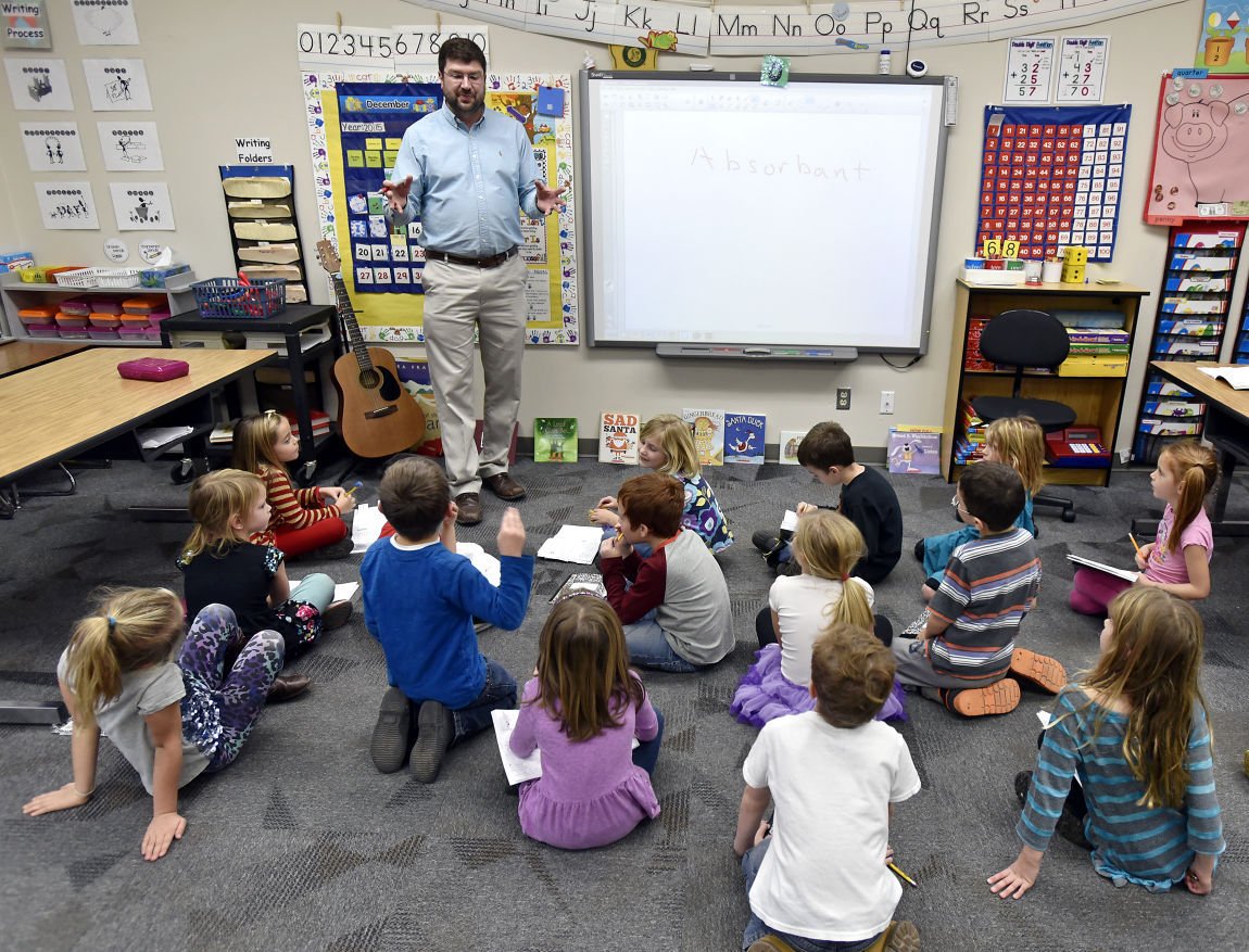 Hellgate Elementary students make artificial snow in science lesson