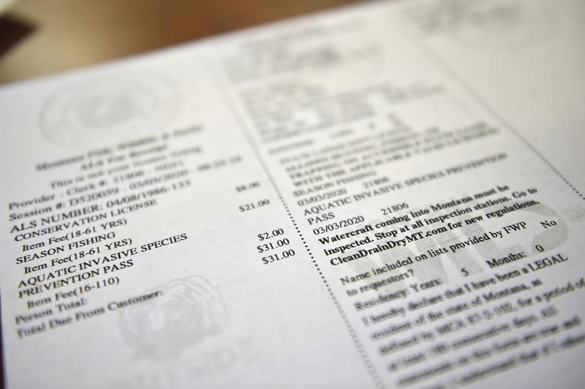 A printed 2020 Montana fishing license