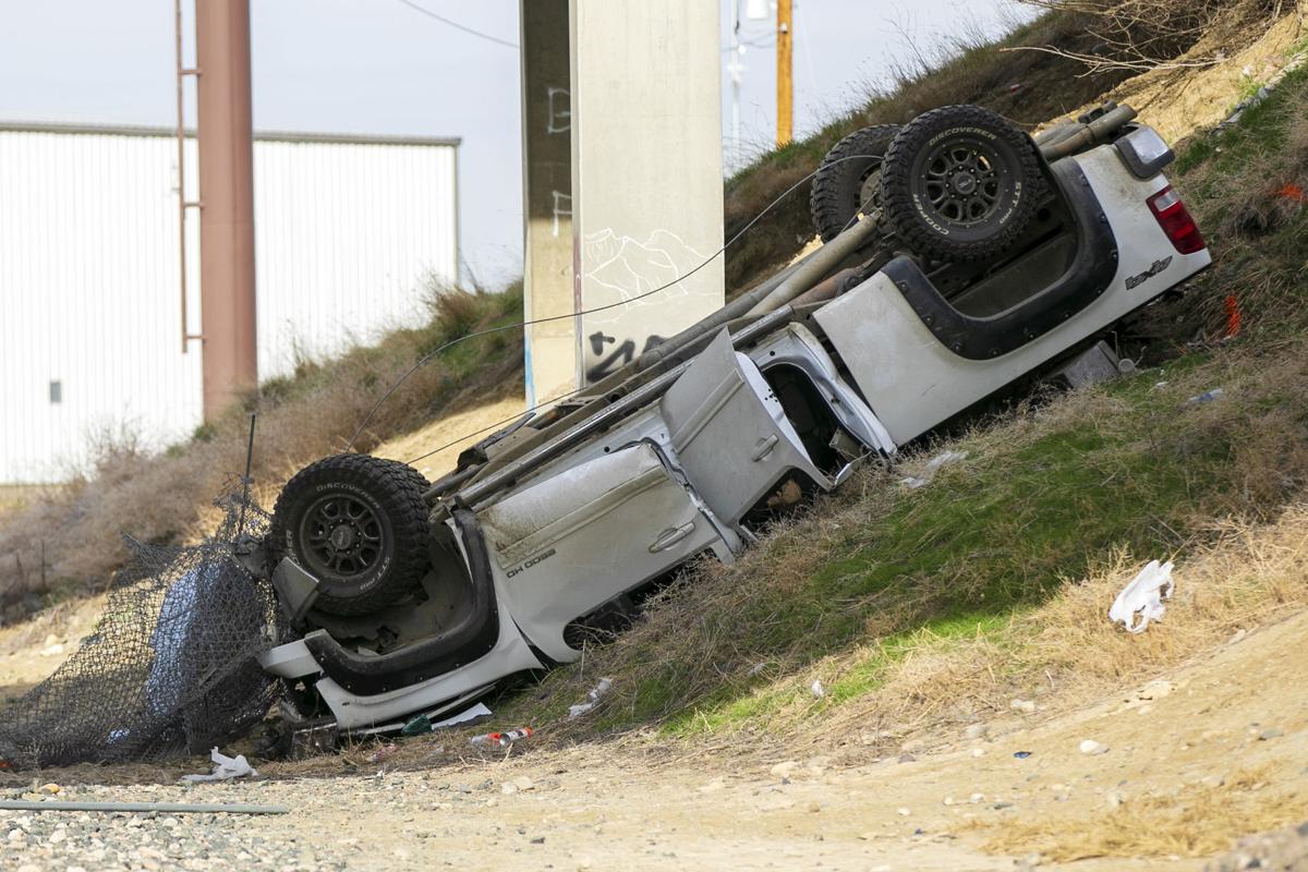 Truck rolls off I-90