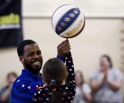 atkinson globetrotter ant his missoulian gets meet gifts most anthony lowell harlem handling afternoon elementary skills displays tuesday ball last
