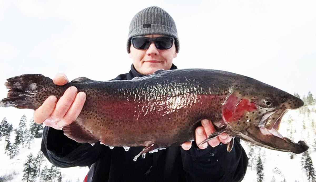 ice settles in on favorite fishing lakes outdoors montana christmas skies