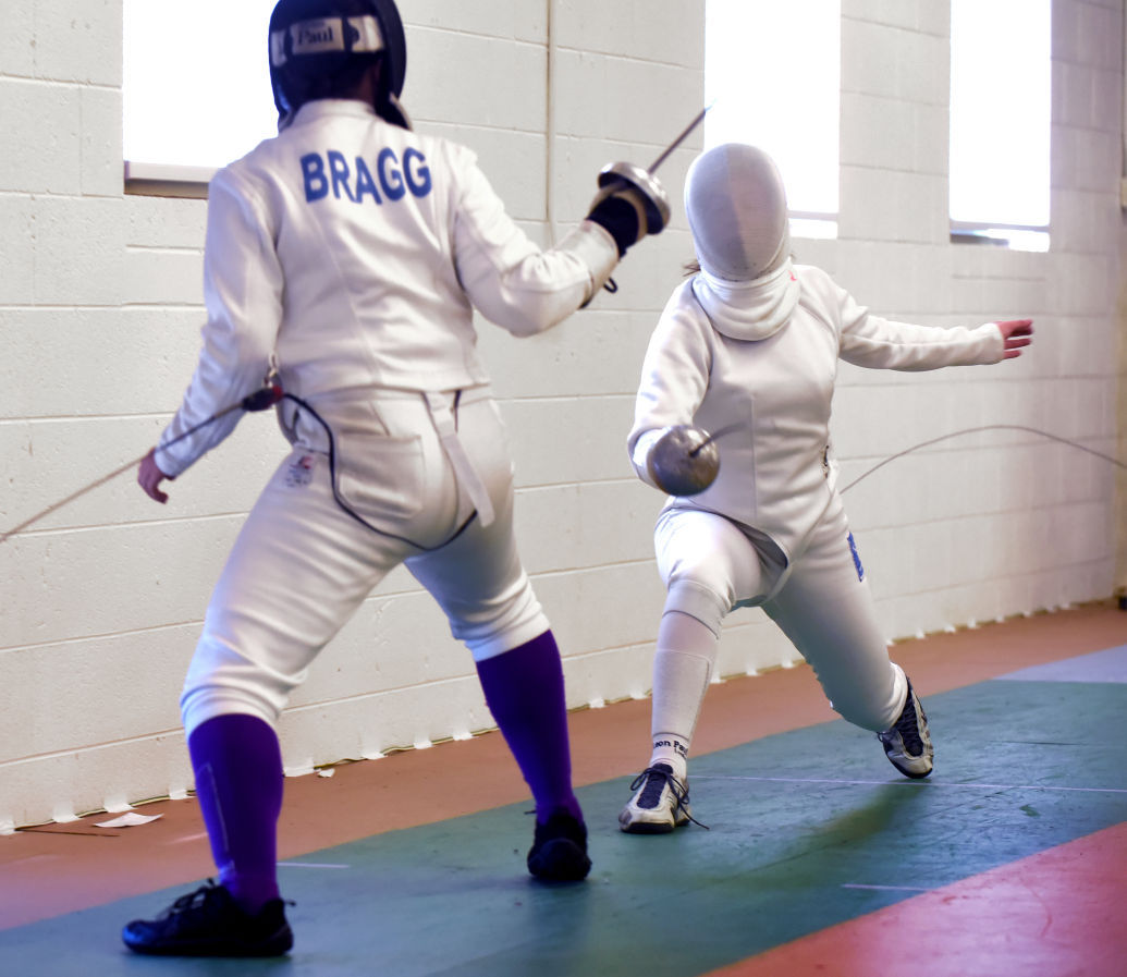 Swords clash at qualifying tournament for fencing nationals Local