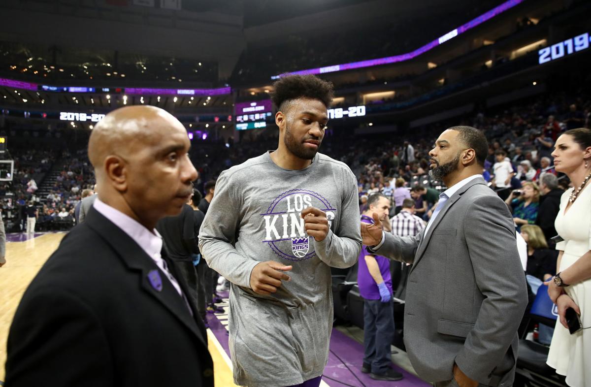 The Sacramento Kings' Jabari Parker, middle, leaves the court after a game against the New Orleans Pelicans was postponed due to the coronavirus at Golden 1 Center in Sacramento, California, on March 11, 2020.