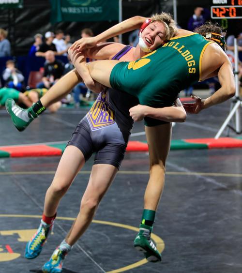 Laurel's Keagan Thompson and Whitefish's Eli Taylor