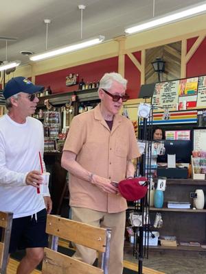 Big Timber pharmacy serves up milkshakes to Bill Clinton and Adam Schiff during quiet pit stop
