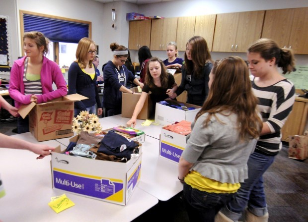 Hellgate Elementary students collect T-shirts for Ghana orphans