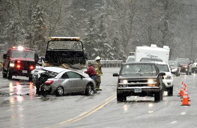 Mhp Actively Seeking Driver Who Fled Crash Scene On Evaro Hill 2 A Wrecked Penger Car Is Loaded Onto Truck After Two Vehicle Crash On Evaro Hill Tuesday The Southbound Lost Control And Spun 180 Degrees