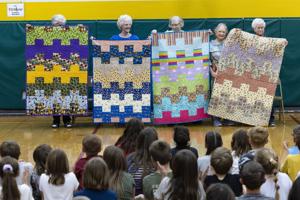 Local quilting group blankets Helena schools with 65 donated comforters