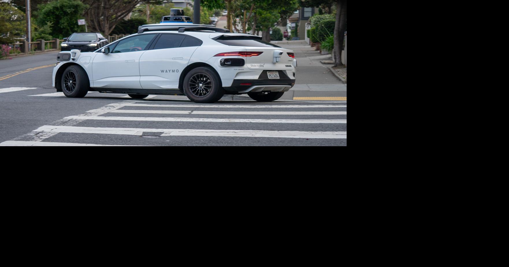 A Waymo driving down Church Street on Friday, May 22, 2026, in San Francisco, California.