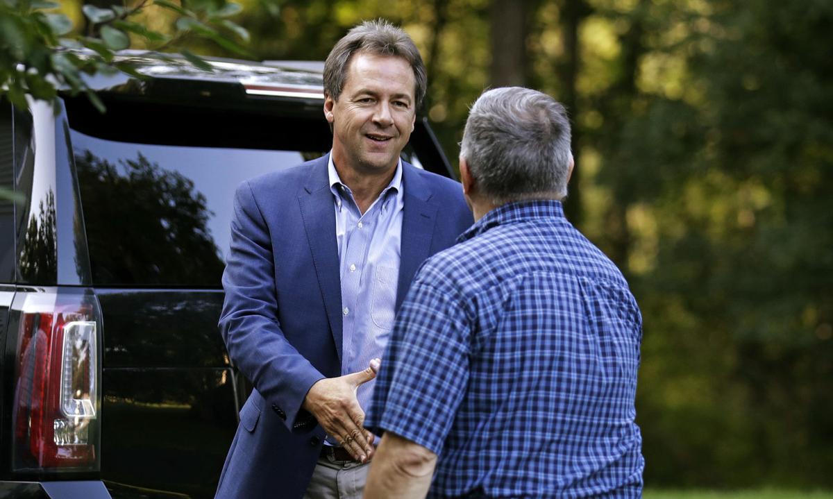 In New Hampshire, Bullock plays down missing debates