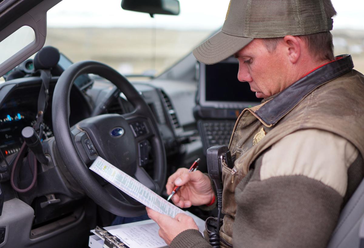 Wyoming game warden's opening day includes salutations, citations