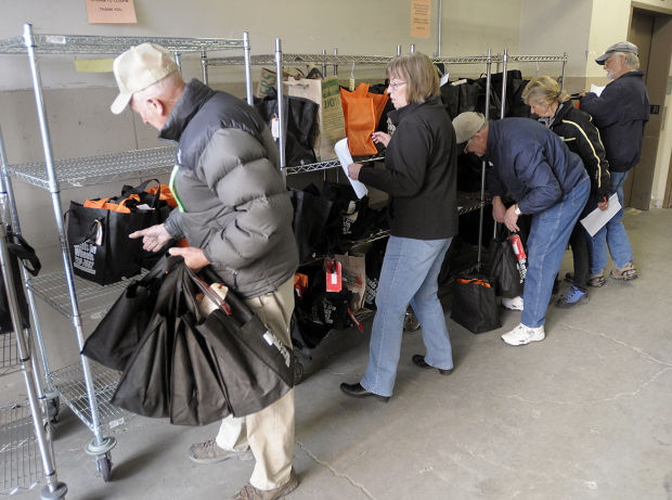 Missoula leaders help deliver food to elderly, homebound