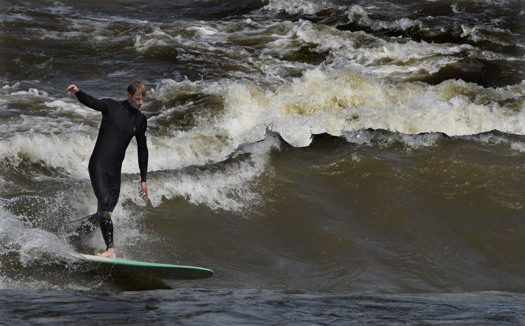 clarks surfing wave