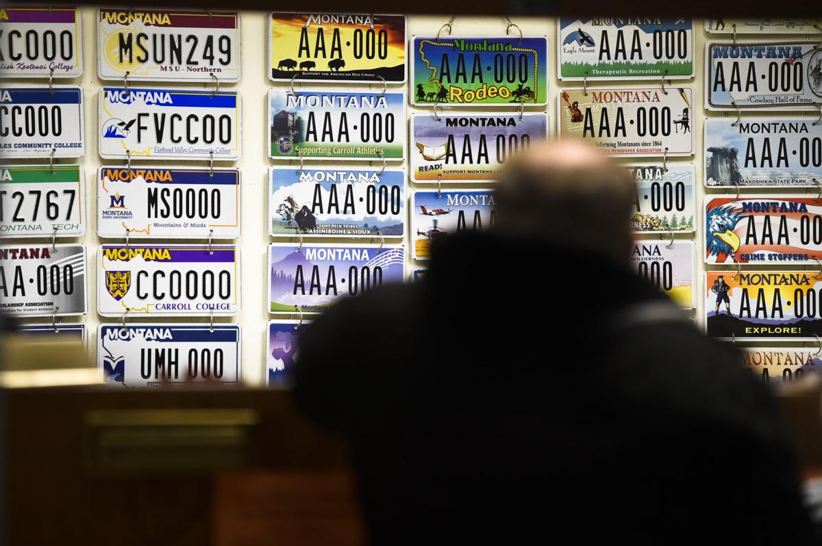 A man renews his vehicle registration