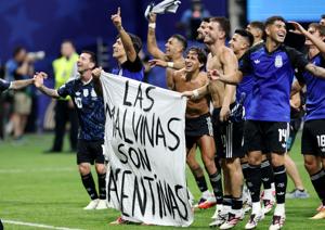 Argentina players wave banned political banner after World Cup win