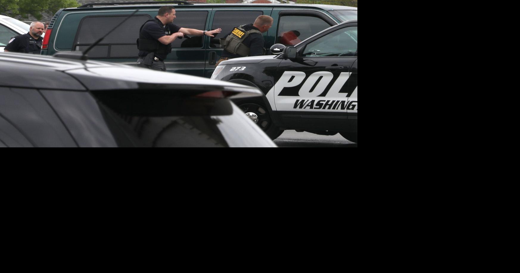 Man taken into custody after standoff on Washington Police parking lot ...