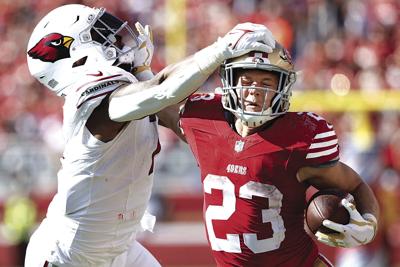 McCaffrey, 49ers run past Cardinals, Sports