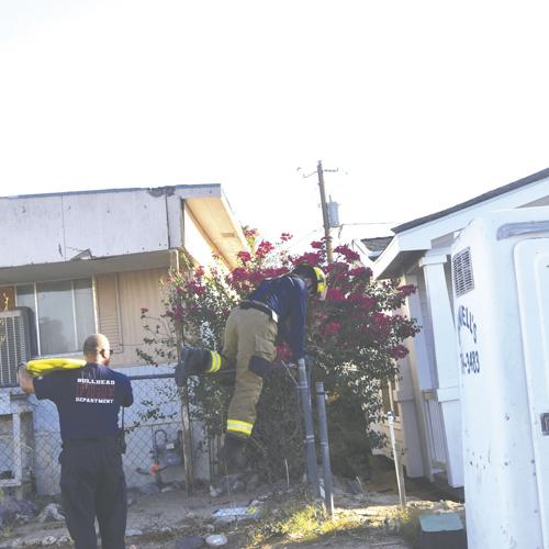 Firefighters rescue men trapped under manufactured home in Bullhead ...