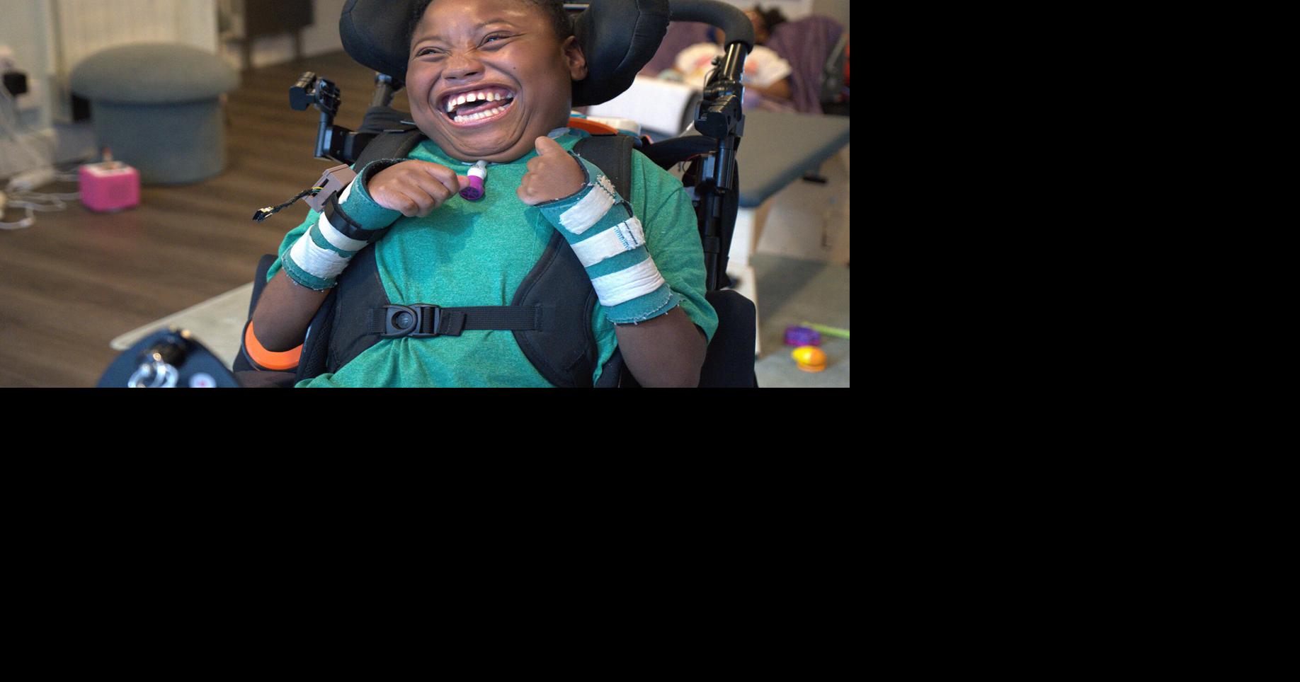 Boy with disabilities finds joy through toy designed by engineering ...