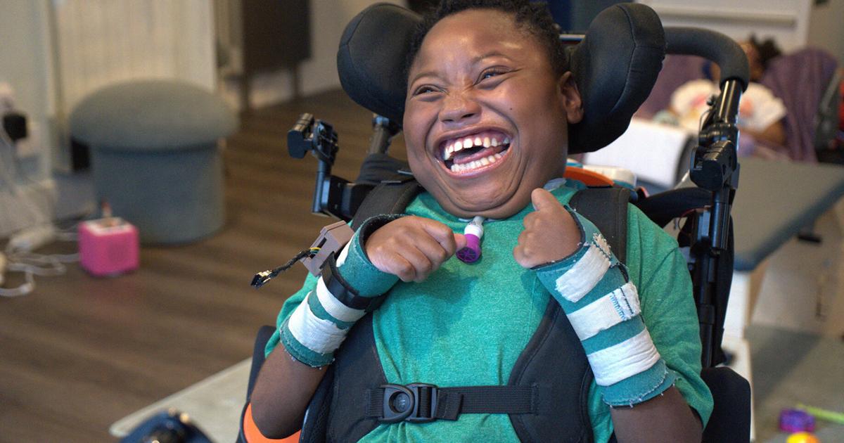 Developmental Disability Boy Boy with disabilities finds joy through toy designed by engineering ...