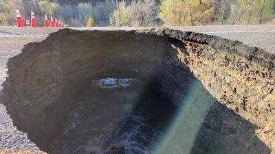 Hole-y moley! Sinkhole eats part of Highway 133; road closed