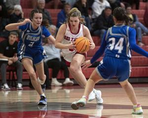 Wildcat girls escape with 42-32 win over Red Hawks