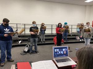 MHS choir students persevere with COVID-19 rules