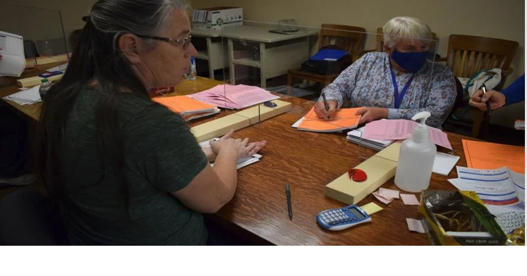 Clerk: Hand-counting votes less accurate than by machine; mail-in ballot system is secure