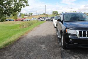 Families adjust to new traffic loops at Johnson Elementary for drop-off and pick-up as part of school's safety procedures