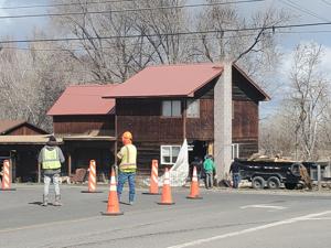 2 injured when their SUV crashes into living room