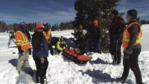 Stranded snowmobilers rescued through multi-party effort