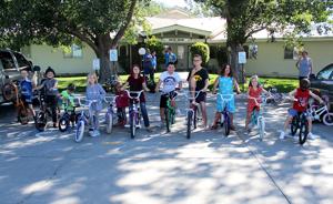 Jesus Bikes delivers bicycles to children at Haven House Monday; Still looking for bicycle helmets