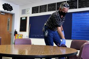 One desk at a time, custodians clean the schools during COVID-19 to keep students, staff safe