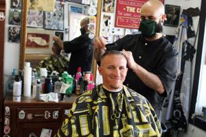 Customers support local businesses as they reopen during COVID-19