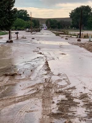 Kiowa Road and Jasmine Road closed due to flooding after afternoon showers
