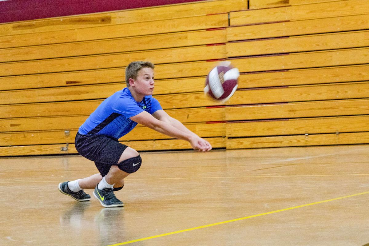 Trying to create a spike in boys volleyball News