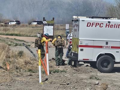 Crews fight brush fire near Colorado Outdoors