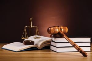 Feds indict 3 on drugs and weapons offenses; defendant claims conspiracy, involving COVID-19, to silence her