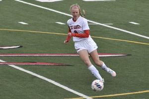 Demons girls' soccer takes down Red Hawks in overtime