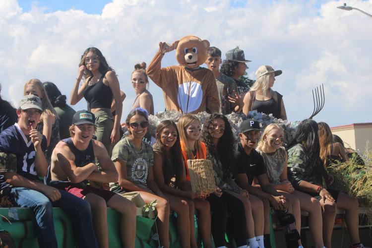 Olathe High School students take in some sun for parade