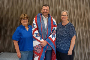 Hospital CEO, former Navy SEAL receives Quilt of Valor