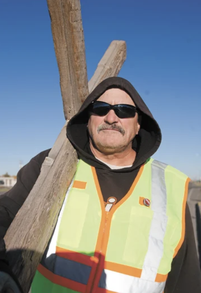 Suspected driver charged in hit-and-run that sent man known for carrying a cross to the hospital; County commissioner pushes false narrative that crash was intentional act of violence by 'radical, insane, liberal Left': 'They deliberately tried to kill him'